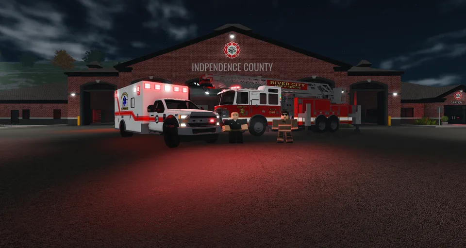 Firefighters, an ambulance, and a ladder truck outside the fire station